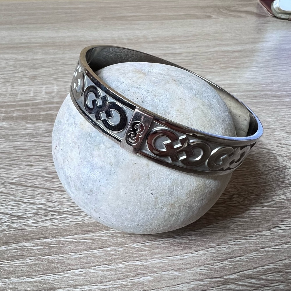 Cole Haan Silver Tone Bangle Bracelet – Logo Pattern
